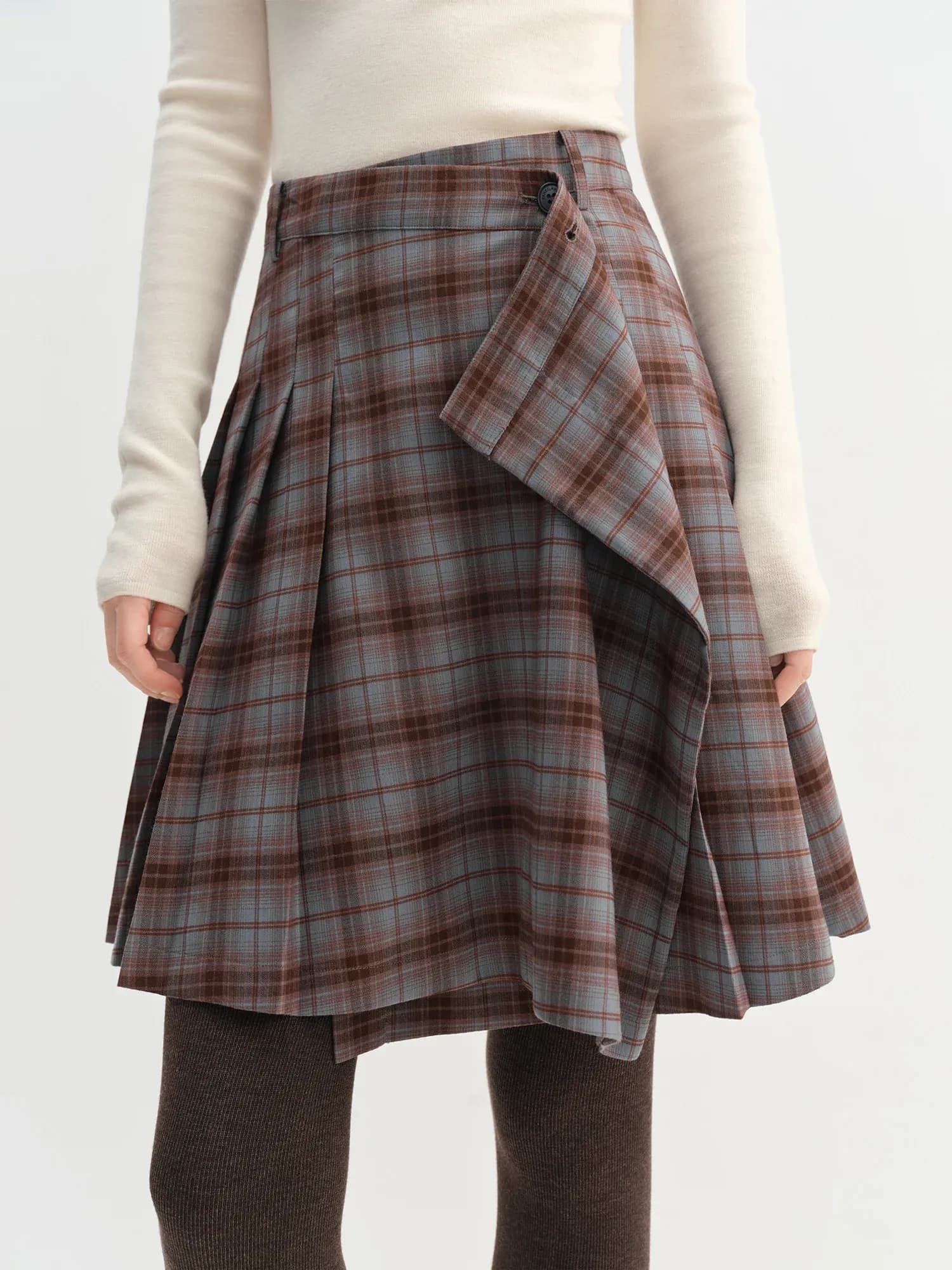 Mini jupe plissée à carreaux asymétrique hiver 2025