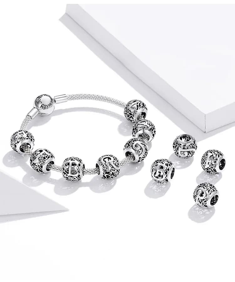 Breloque lettre florale en argent 925 WOSTU