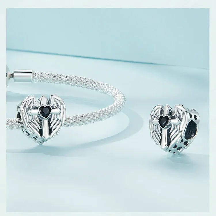 Breloque croix et ailes en argent 925 WOSTU