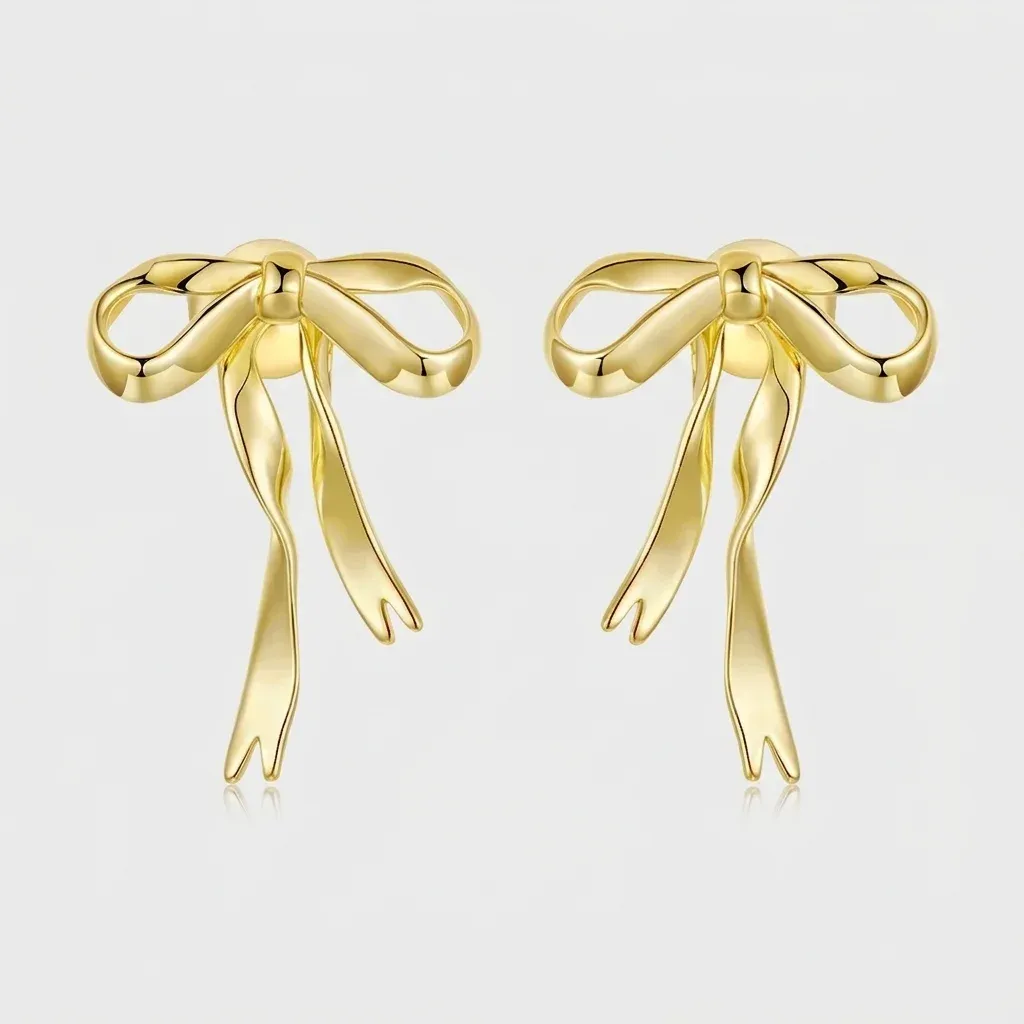 Boucles d’oreilles nœud doré WOSTU